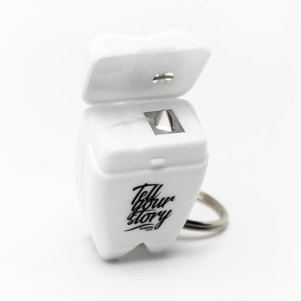 Privjesak za ključeve u obliku zuba sa zubnim koncem