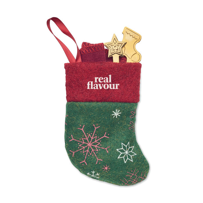 Set pribora za jelo u božićnoj čarapi