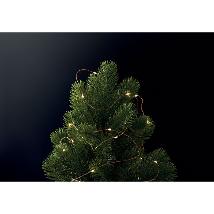 Promotivne Božićne lampice Niz od 50 LED lampica u toplom žutom svjetlu na drvenom kolutu. Duljina: 5m. 3 AA baterije nisu uključene.